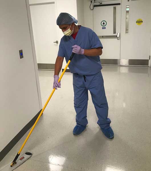 EVS-worker-cleaning-floor2-cropped